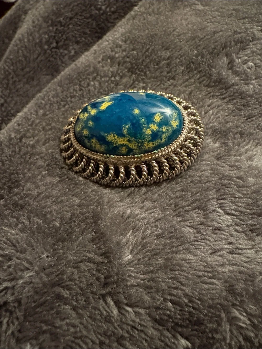 Blue and Yellow Speckled Lucite? Oval Brooch with Silver-Tone Rope Frame